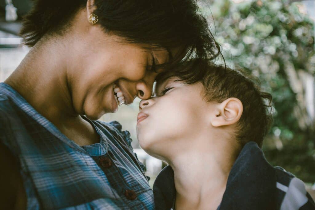 Mom and son hugging