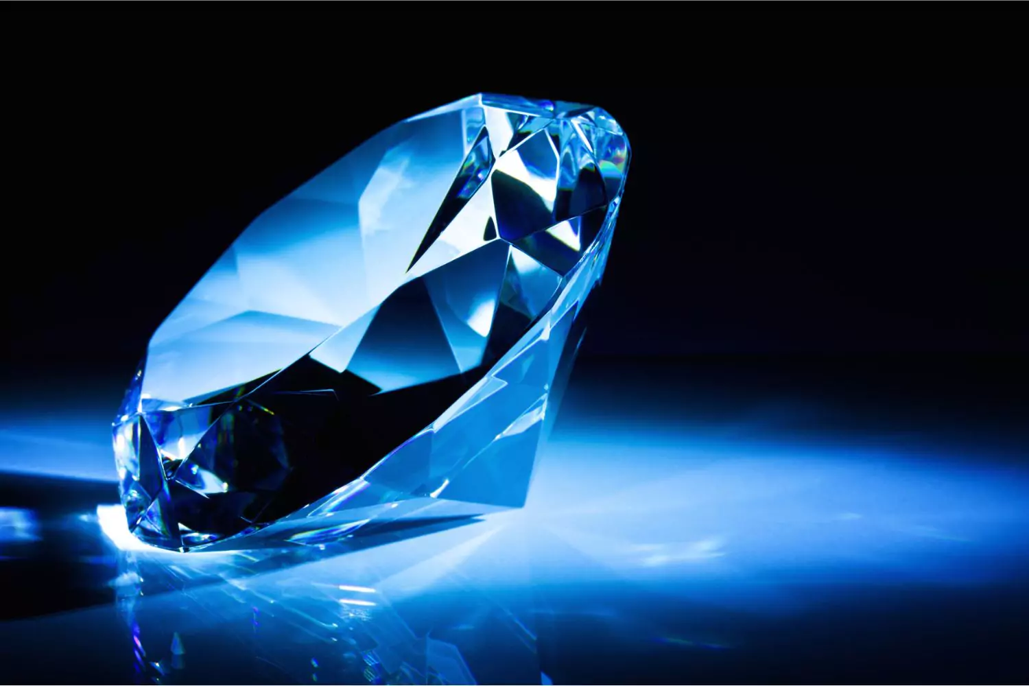 A radiant, multi-faceted diamond illuminated by blue light, symbolizing the virtues of a Proverbs 31 woman—strength, wisdom, and priceless worth. The gemstone reflects purity and resilience against a dark background.